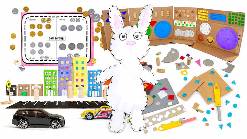 A collage of a coin sorting activity, a cardboard dashboard, a paper bunny, a street scene made of cardboard, a cardboard crafts activity.